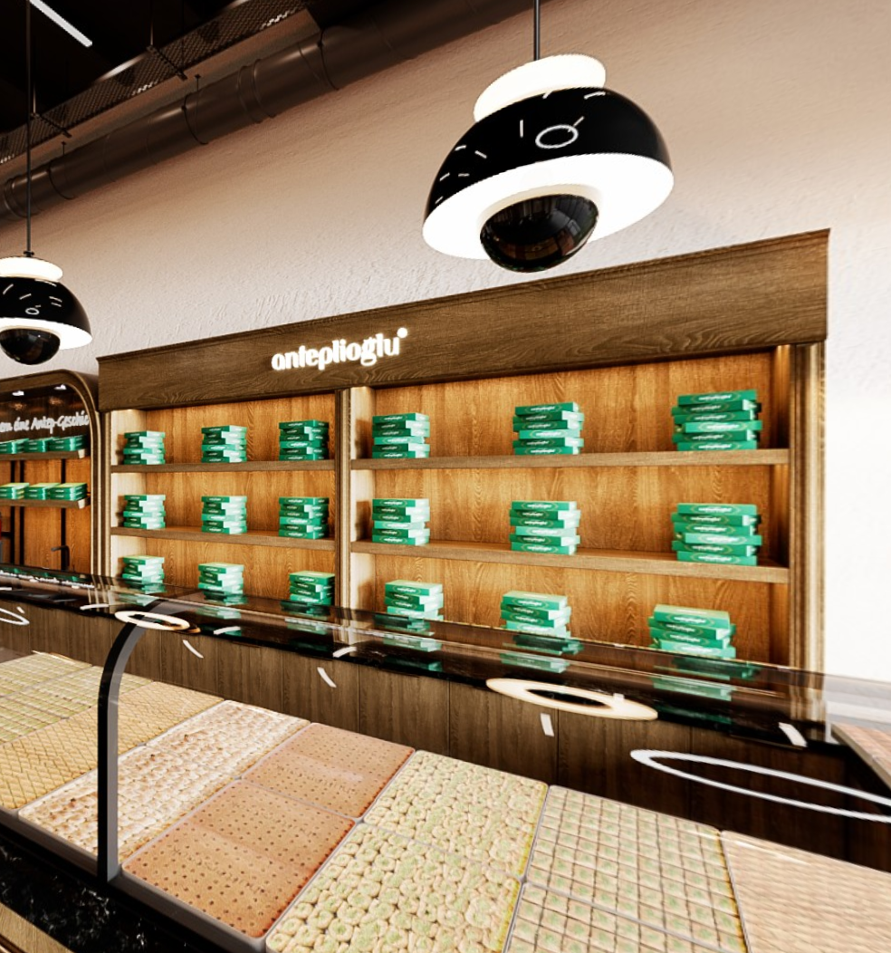 Verkaufsbereich von Anteplioğlu Baklava Mannheim mit beleuchteten Produktregalen und maßgefertigter Einrichtung