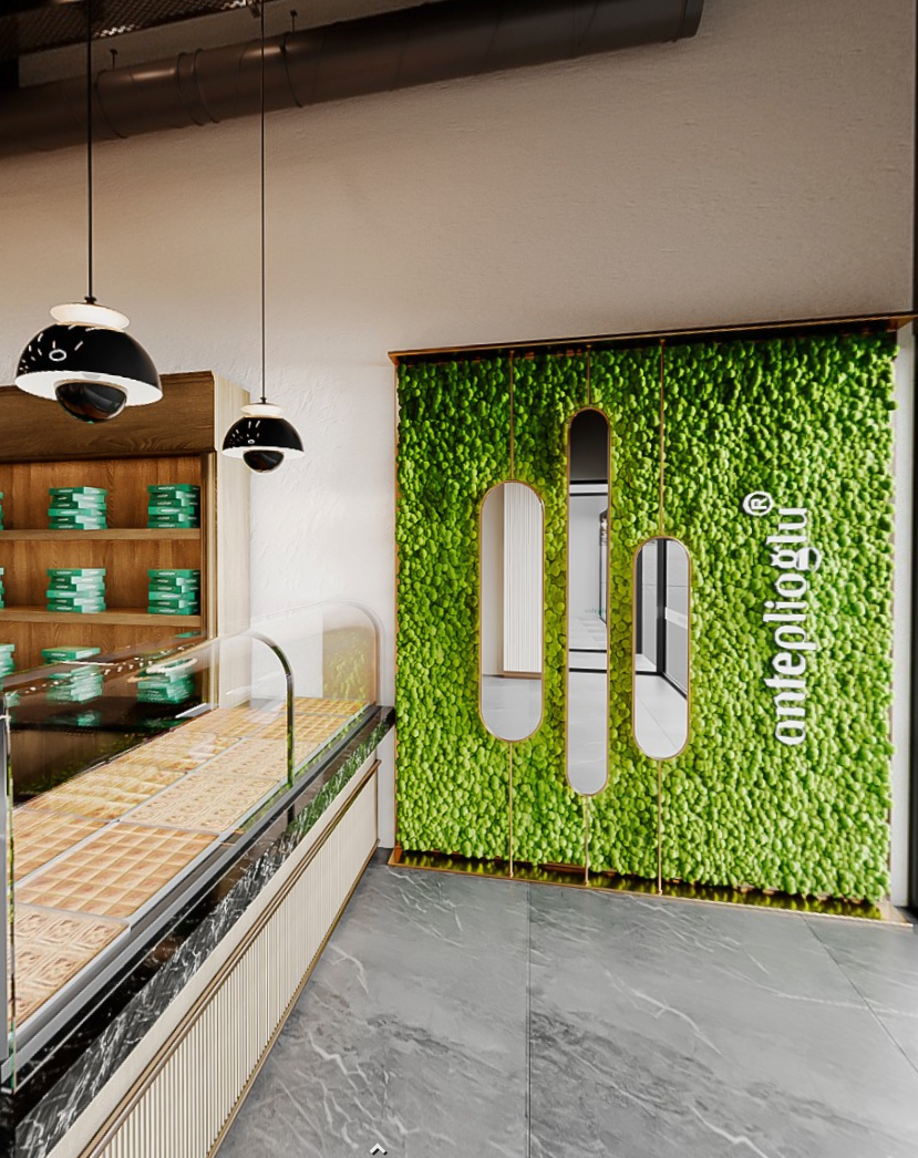 Bäckerei-Innenausbau Mannheim mit beleuchteter Logo-Wand, Pflanzenfläche und modernem Verkaufsbereich